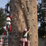 Children on rock climbing wall