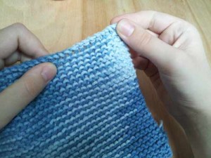 Stretch edge of wash cloth