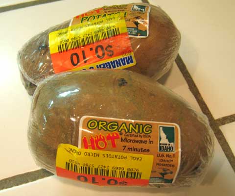 Plastic wrapped organic potato